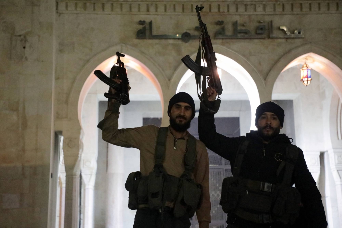 Syria rebels capture another key city in fresh blow to Assad