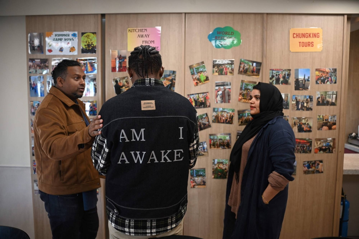 U.S.-bound refugees in Hong Kong despair as Trump halts arrivals