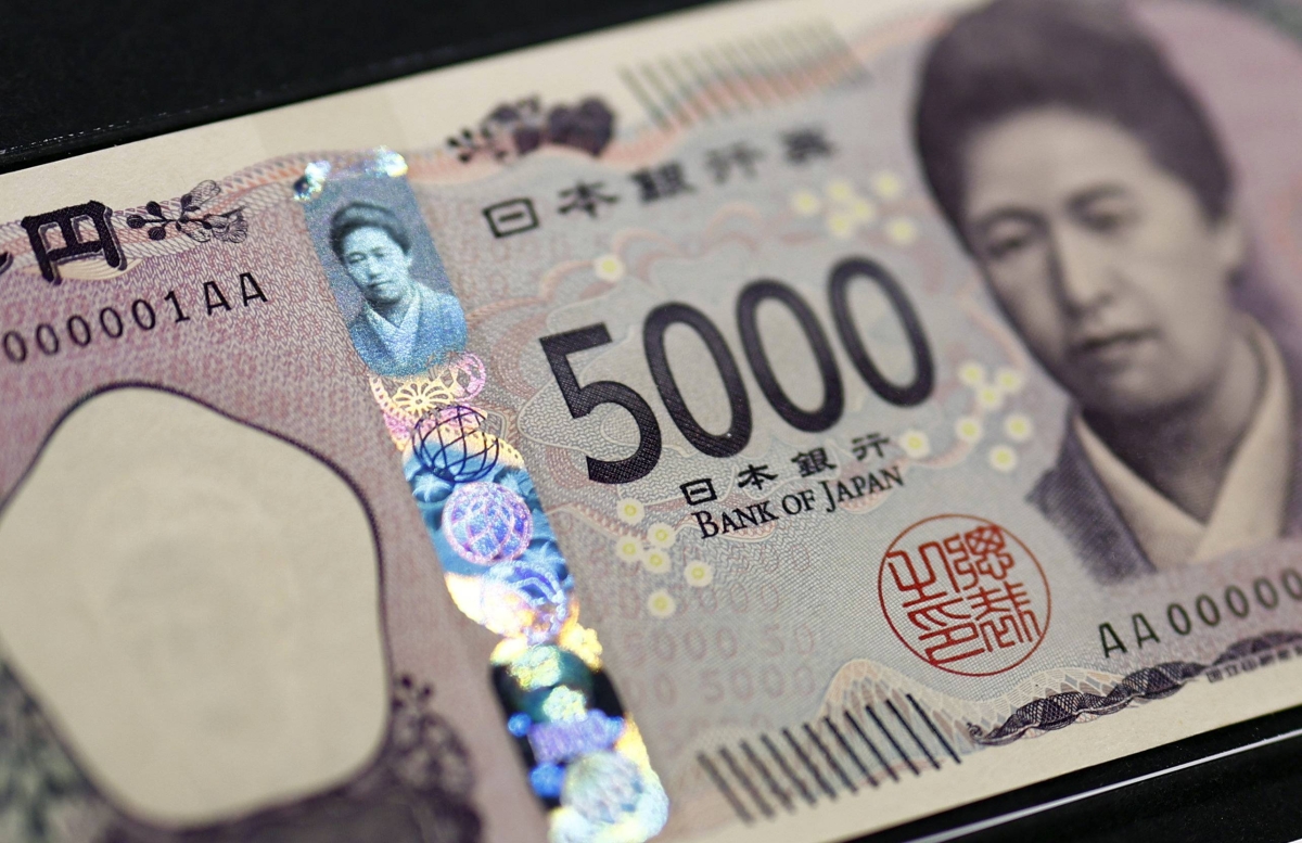 Yen climbs to its strongest this year versus dollar on BOJ hike bets