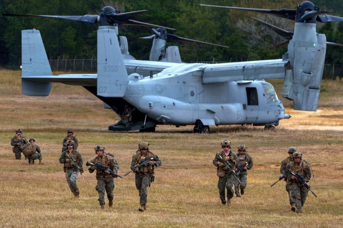 U.S. Marines start to leave Japan, decades behind schedule